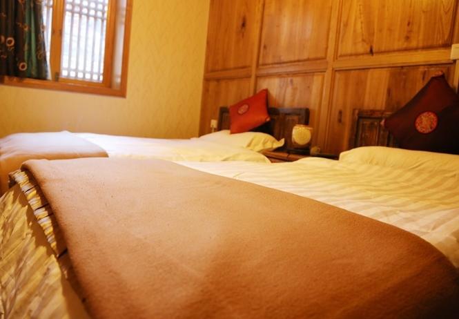 Aparthotel Li Dao Yuan Lijiang  Zimmer foto